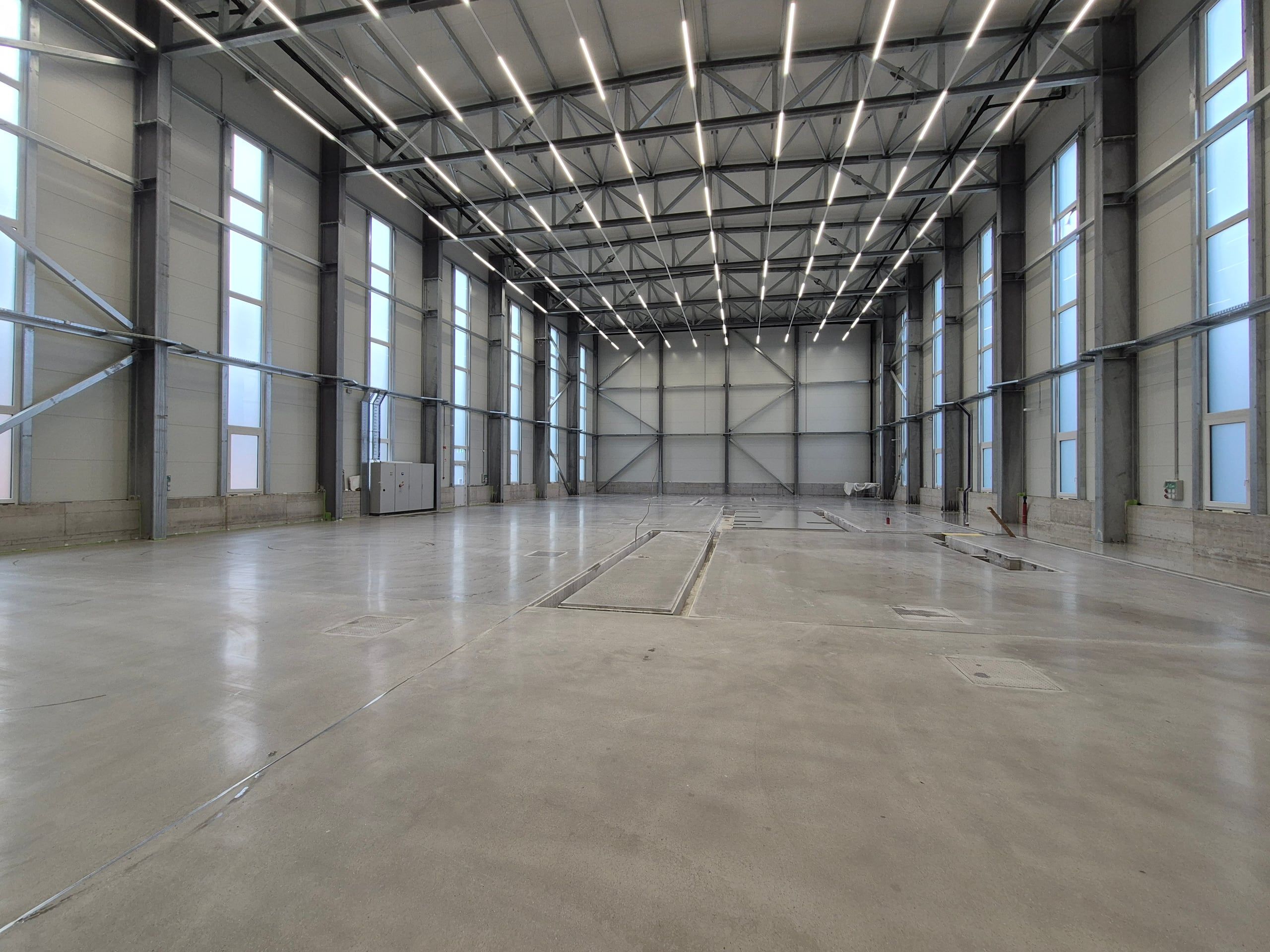 Long industrial hall with a treated concrete floor